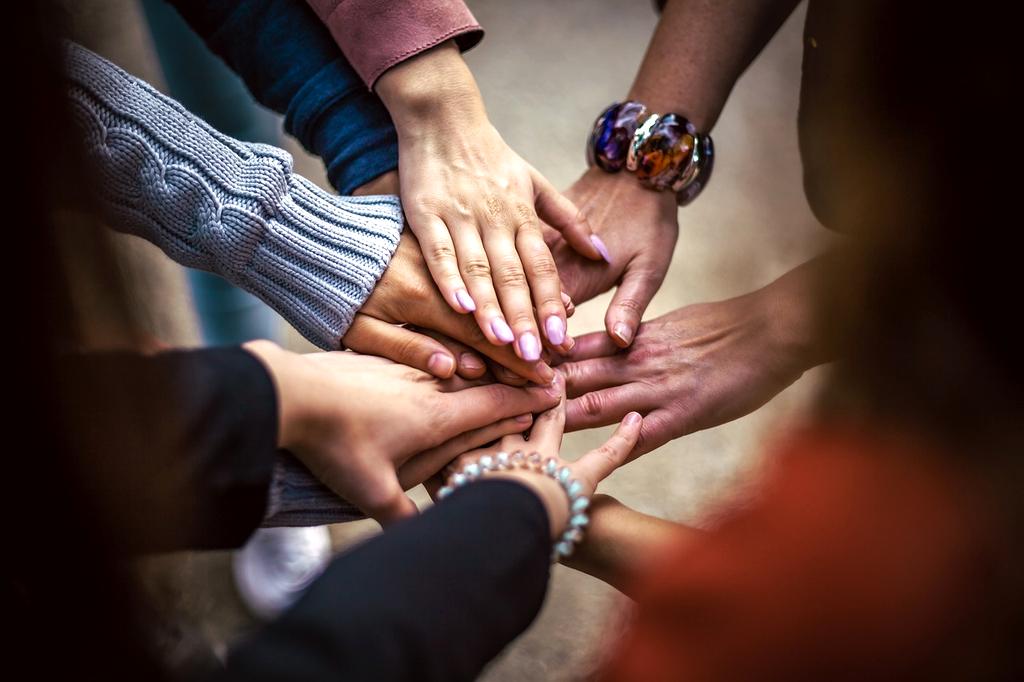 Team collaborating over futuristic IT architecture